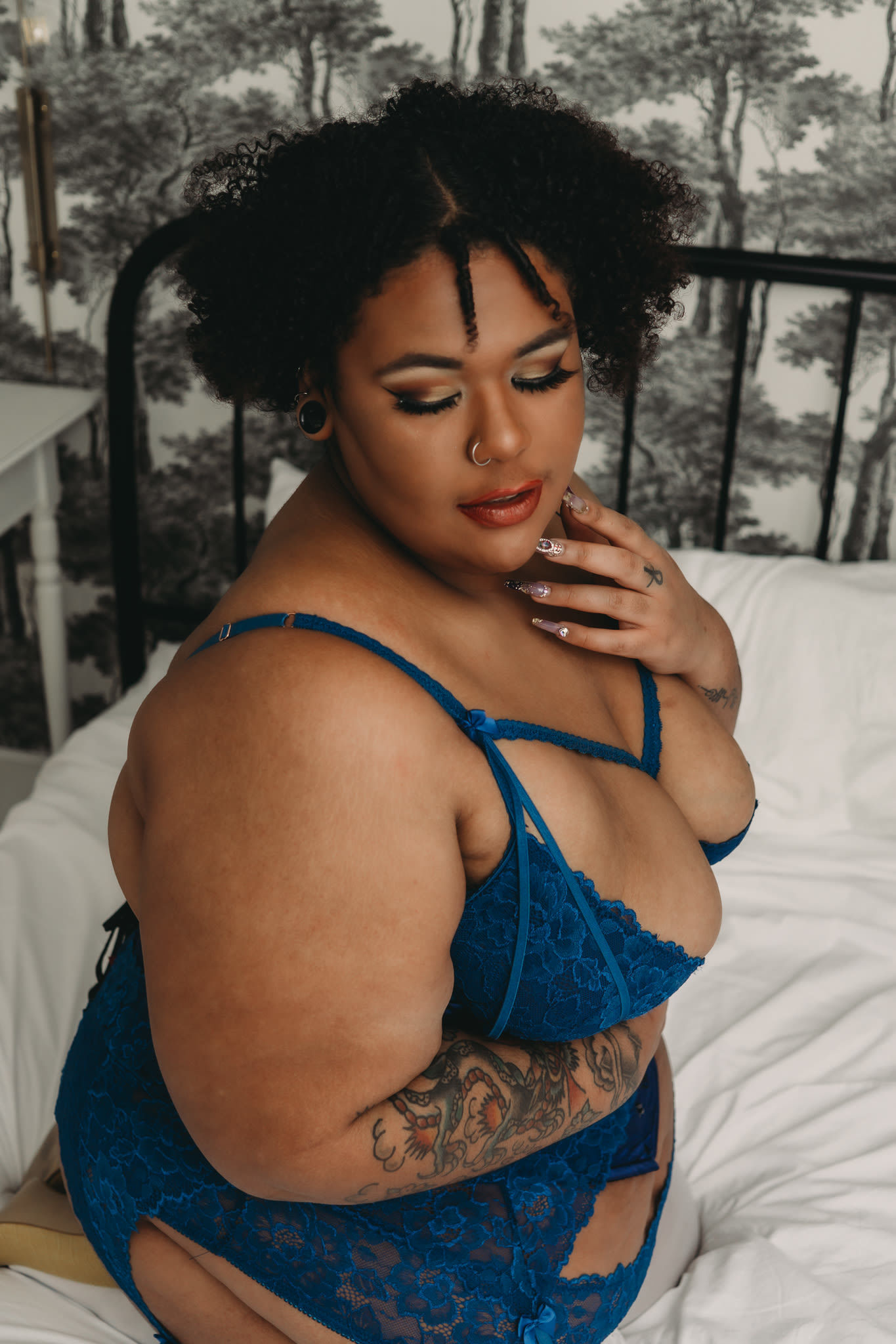 Woman kneeling on bed wearing blue body suit. Photo by Embodied Art Boudoir, boudoir posing, boudoir inspiration, plus size photography, plus size boudoir, plus size glamour, plus size posing, plus size outfits, fat boudoir, fat empowerment, body positivity, fat positive, body positive, body confidence, body empowerment, haes, colorado boudoir, denver boudoir