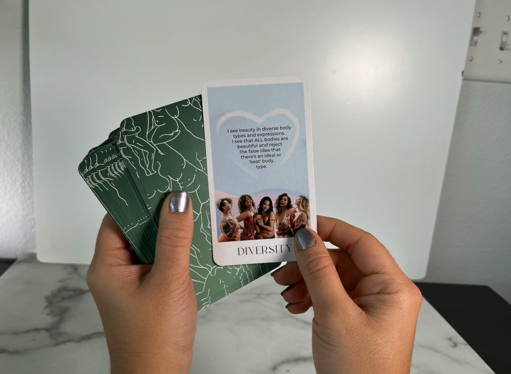 Card deck, showing the card reading Diversity. Photo by Embodied Art Boudoir. Affirmations, Affirmation Cards, mindfulness, confidence, self love, self love journey, affirmation practice, daily routine, self care routine, self care, female empowerment, self confidence, self worth, the body deck, connection, shop online, cards, body positivity, boudoir photoshoot, colorado boudoir, denver boudoir, boulder boudoir, colorado springs boudoir, boudoir inspiration, photography inspiration