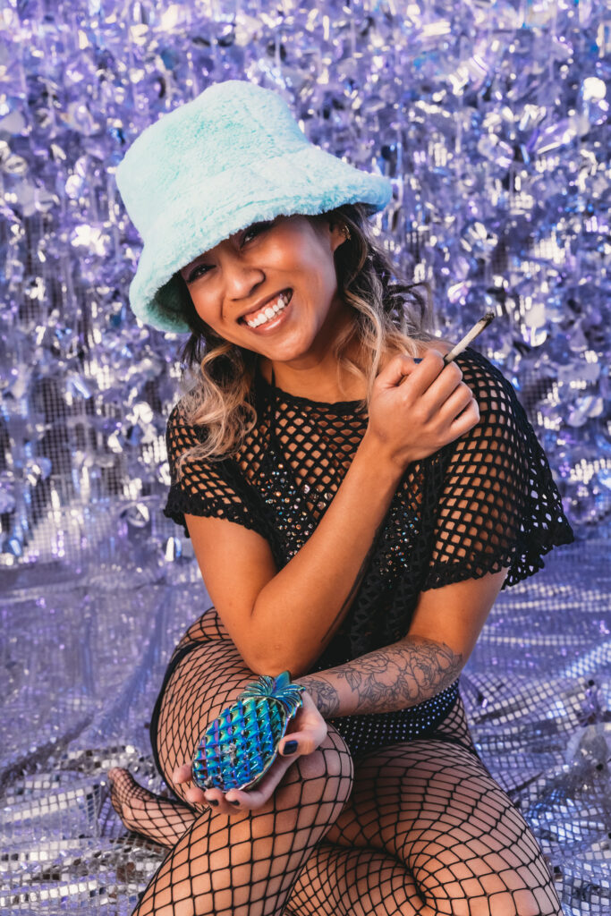 Woman sitting down, wearing a blue bucket hat and see through black outfit. Photo by Embodied Art Boudoir. Personal growth, expanding your mind, growth, productivity, goal-getter, self-discovery, finding yourself, goal set, be yourself, challenge yourself, try new things, make changes, embrace change, expand your mind, be happy, evolution, get out of the comfort zone, colorado boudoir, denver boudoir, boulder boudoir, colorado springs boudoir, boudoir ideas