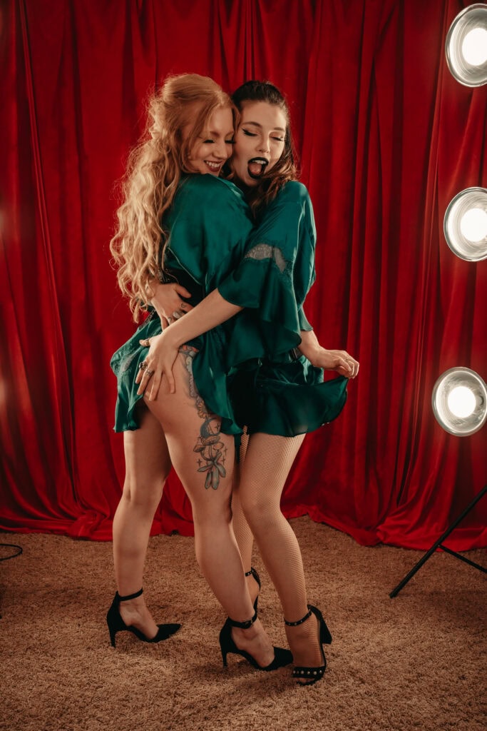 Two woman embracing, wearing matching green robes. Photo by Embodied Art Boudoir. Personal growth, expanding your mind, growth, productivity, goal-getter, self-discovery, finding yourself, goal set, be yourself, challenge yourself, try new things, make changes, embrace change, expand your mind, be happy, evolution, get out of the comfort zone, colorado boudoir, denver boudoir, boulder boudoir, colorado springs boudoir, boudoir ideas