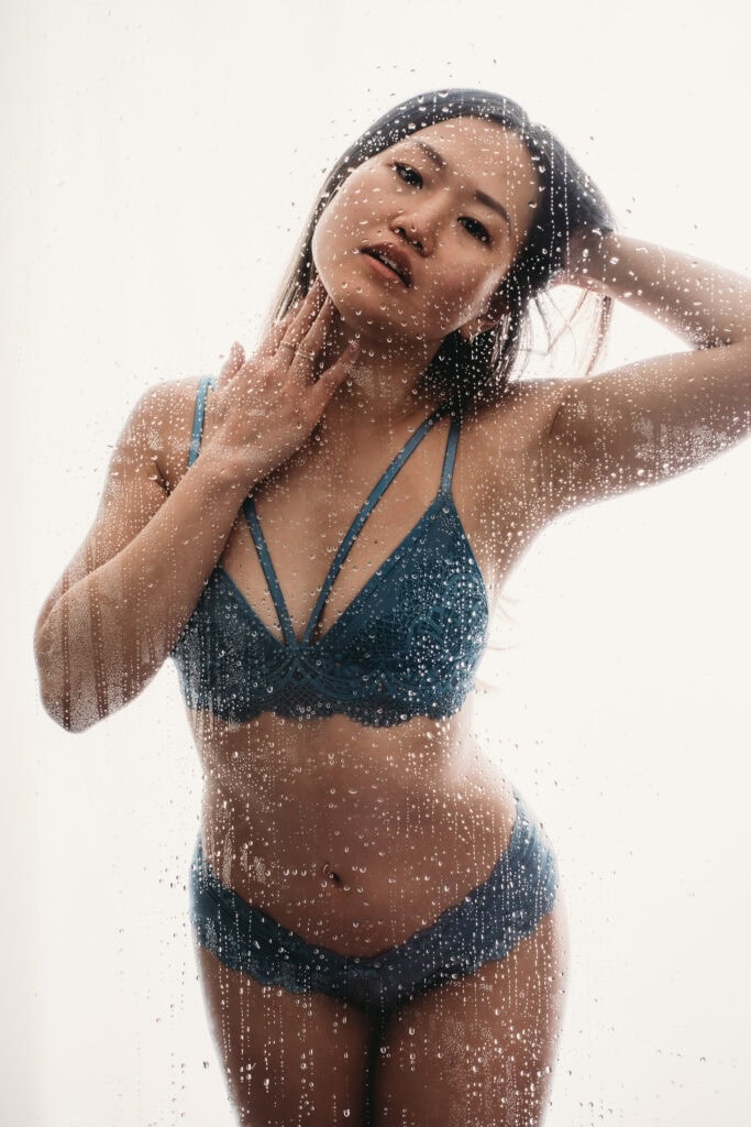 Woman in shower set wearing a blue matching lingerie set. Photo by Embodied Art Boudoir. Find Your photographer, boudoir photographer, boudoir photographers, female boudoir photographer, boudoir images, classic boudoir, boudoir style, classy boudoir, sensual photography, sensual boudoir, colorado boudoir, denver boudoir, boulder boudoir, colorado springs boudoir, boudoir ideas, the perfect match.